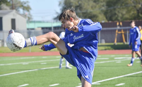 Junior Vincent Baumer snags a ball with his foot during Jesuit's 5-0 win over L.W. Higgins on Jan. 16.