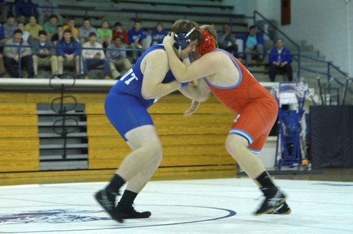 Junior Corey Dublin wrestles against an Archbishop Rummel opponent on Jan. 27, 2016.