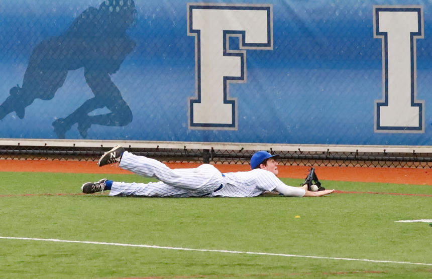 Right fielder Connor Maginnis makes a spectacular diving catch of a foul ball for a big out.