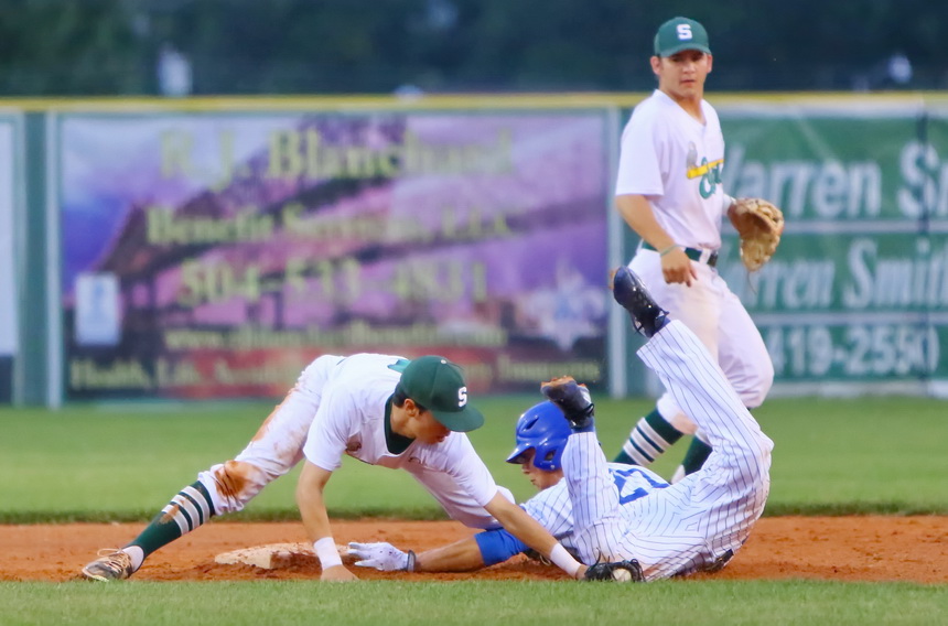 Stephen Sepcich steals second base, barely touching the bag before the tag.