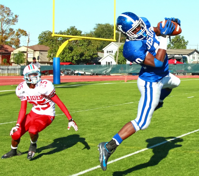 Deion Jones '12 intercepts a pass in a 2012 game against Archbishop Rummel.