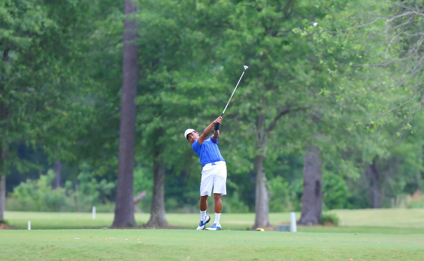 Carlo Carino tees off in the regional tournament held at Carter Plantation on Tuesday.