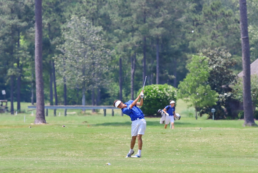 Grant Glorioso tees off on the par-3 17th hole.
