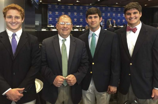 NFF honorees Evan Slattery, Mark Beebe, and Benji Creel with Jesuit head football coach Mark Songy.