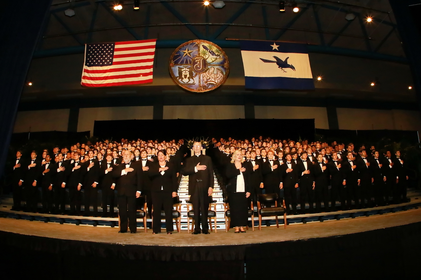 At the start of the ceremony, the National Anthem is played and sung.