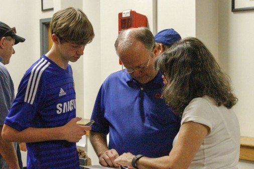 Volunteers assisted Jesuit students and their parents in the hunt for great book deals.