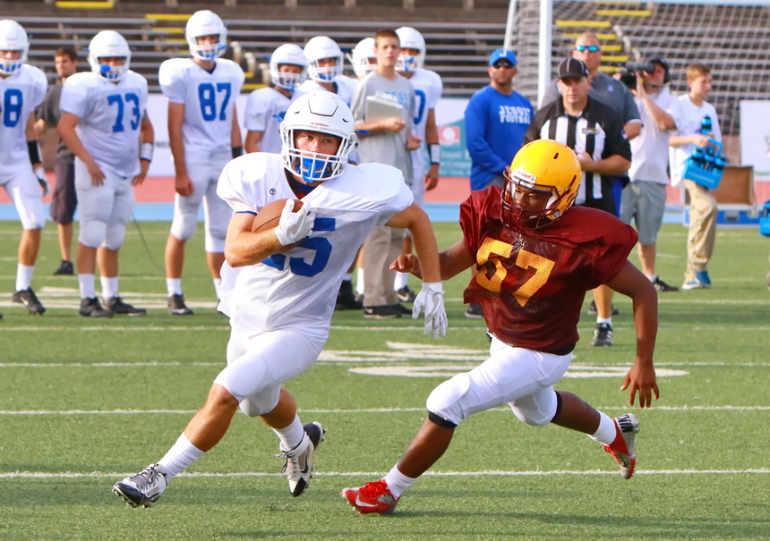 Junior wide receiver and running back Michael Torry catches a pass in the flat and turns it into some positive yardage.