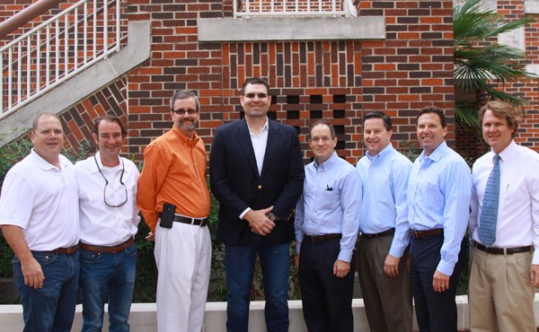 Alumni from the Class of 1983 were at Morning Assembly to address Blue Jays about the importance of the upcoming Thanksgiving Drive. From left are Mike Varisco, Malcolm Schwarzenbach, ____, John Hazard (who spoke on behalf of his class), ____, René Alvarez, David Martin, and Mike Prados.