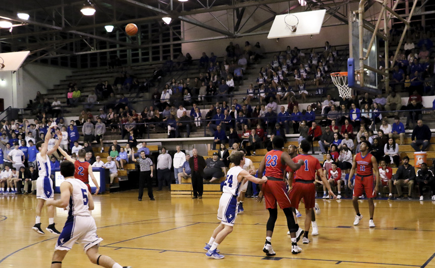 One of Chris Beebe's (12) two first quarter three pointers gives the Jays a jolt at the start of the contest.