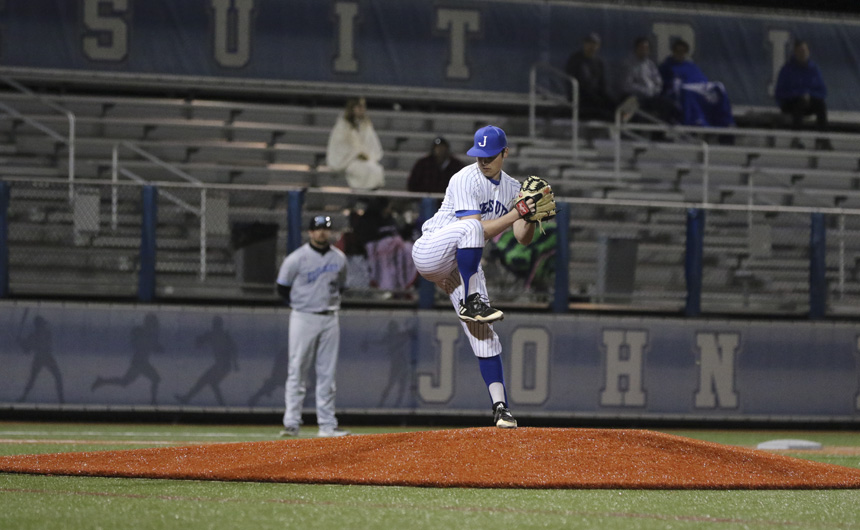 Senior pitcher Davis Martin (1) improves his record to 3-0 by pitching all nine innings and keeping the Broncos to two runs.