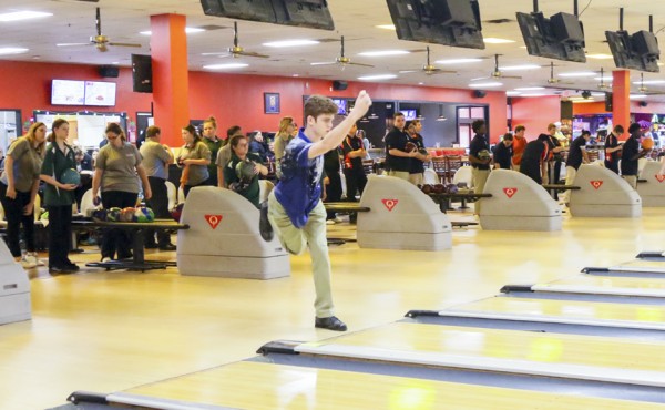 Junior Alex Barron bowled a 206 game and a total series of 523 .