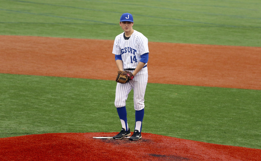 Junior Christian Hess (14) pitch an amazing six innings and struck out six batters.