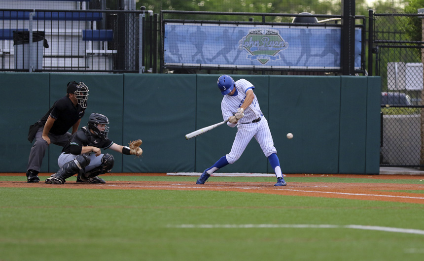In the bottom of the third, senior Stephen Sepcich (27) makes great contact...