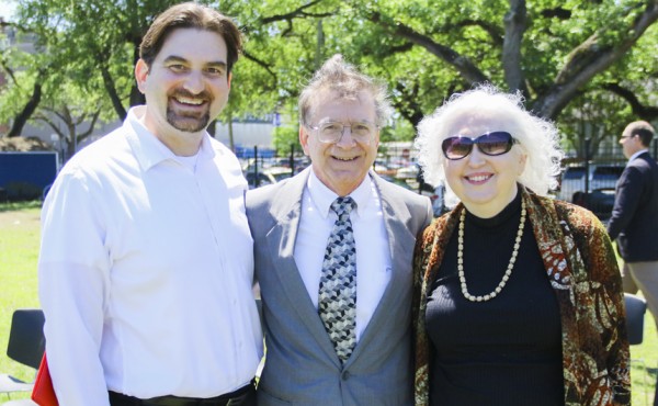 Mr. Rossi is congratulated by his son, Steven, and wife, Diane.