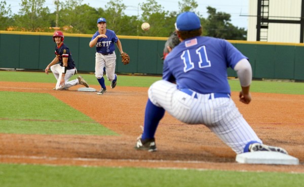 The 6-4-3 double play is successful with a nice grab by first baseman Marc Dougherty!
