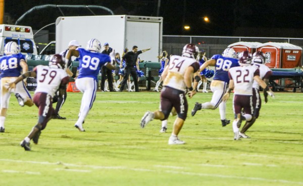 Perri Ganci (#98) scoops and scores on a 57-yard fumble return with 8:05 remaining in the 2nd quarter. 