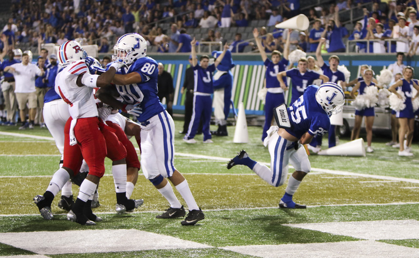 Senior running back Michael Torry crosses the goal line on his first of two touchdowns against the Raiders.