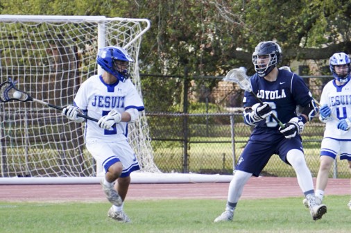 Freshman Andrew Brown controls the ball against Loyola Prep.