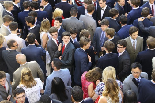 Seniors meet up with their parents after Mass.