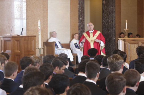 Fr. Christopher Fronk, S.J., celebrates Mass as the principle celebrant and gives the homily.