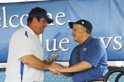 Mike McMahon presents the Lifetime Acheivement Award to Joe Macaluso '65