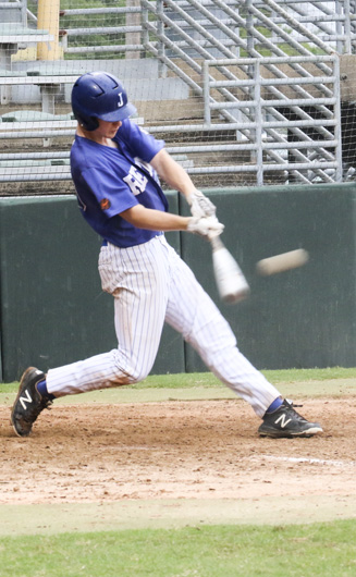 Will Hellmers smashes a double.